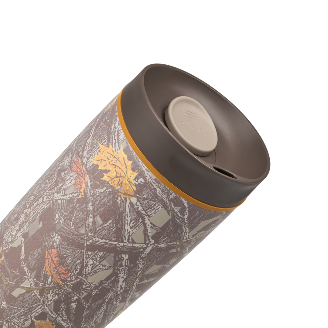 Owala SmoothSip Slider 20oz in Out of Sight, angled lid view showing dark brown lid with tan slider button and sip hole, orange accent ring at the lid base
