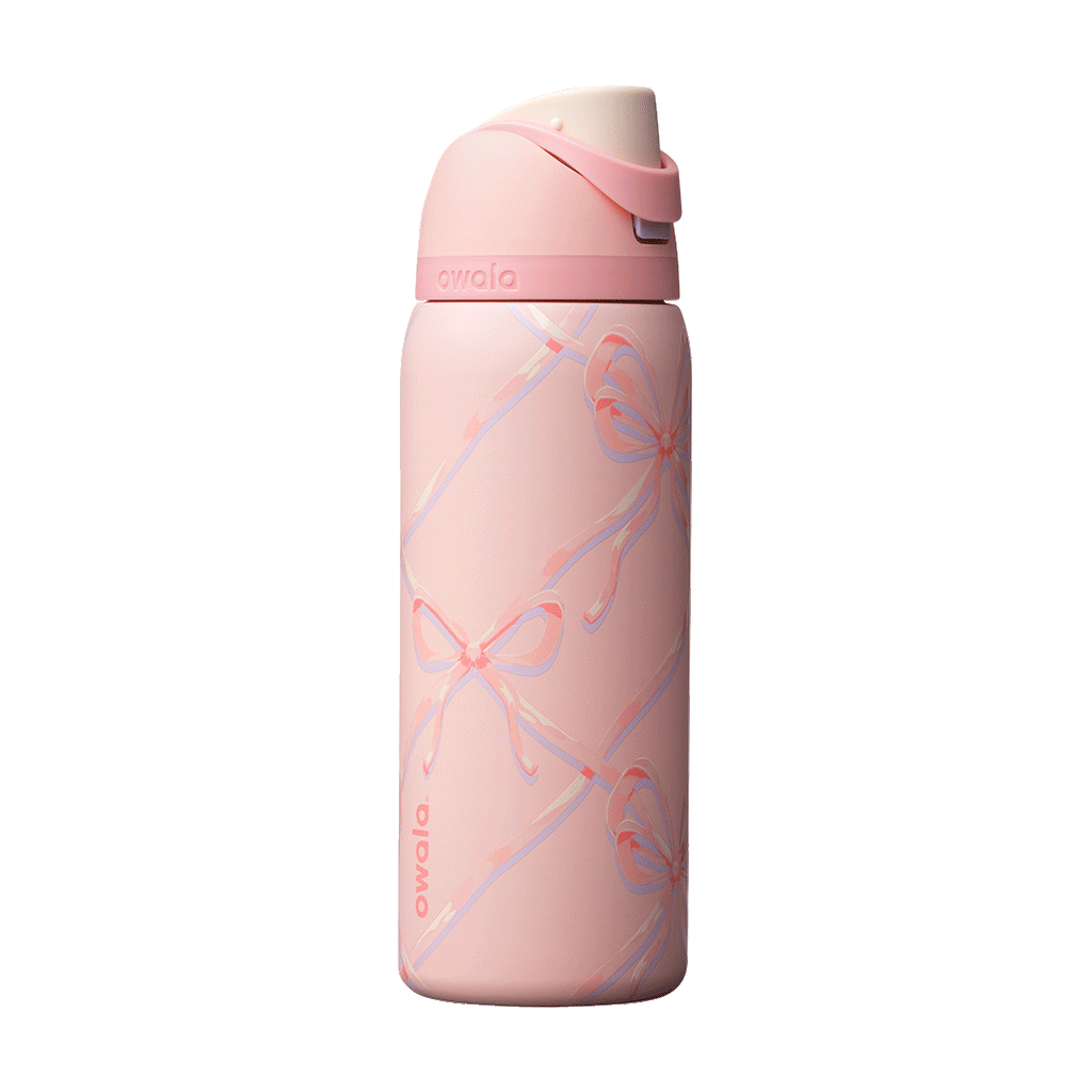 FreeSip 32oz Sugar Plum Fairy; rotating view of light pink body with diagonal lattice pattern of pastel pink, lavender, and cream ribbon bows, matching pink flip cap, pink carry loop, and cream push-button